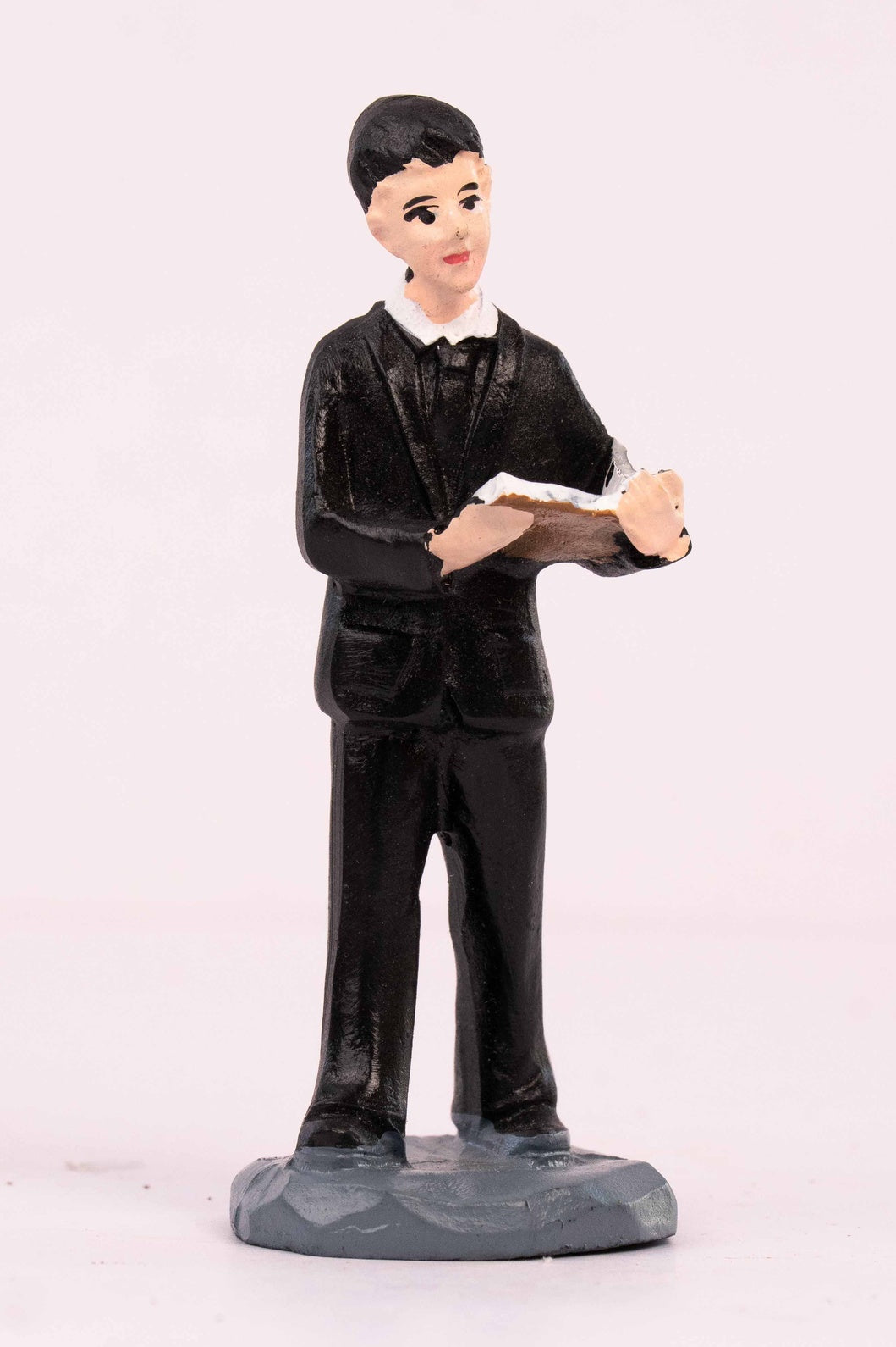 A Man Reading a Book Miniature