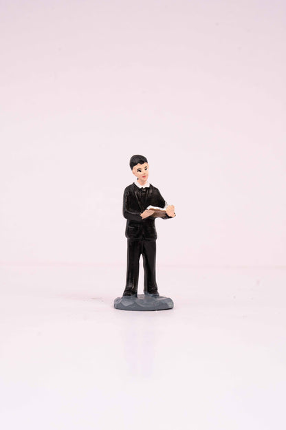 A Man Reading a Book Miniature